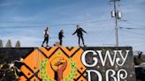 'Cherokee, in the center': Asheville murals project paints way for an indigenous movement