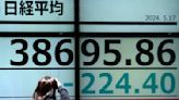 Stock market today: Asian shares are mixed as China stocks get bump from new property measures