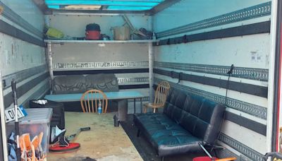 Living in rusty shipping containers and earning £2.30 an hour: An unassuming business on a street where things are not as they seem