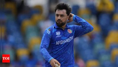 ICC reprimands Rashid Khan for throwing bat on the ground during T20 World Cup match | Cricket News - Times of India