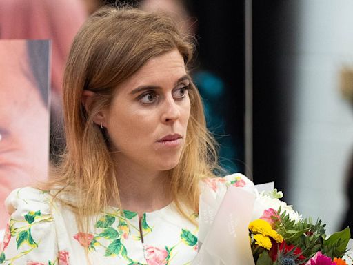 Princess Beatrice looks chic in summery dress at London school