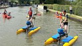 Lib Dem leader Ed Davey water cycles during Oxfordshire visit