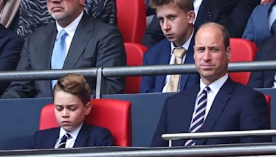 George surprises royal fans by joining dad William at FA Cup