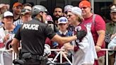 Police officer tries to stop Bowen Byram from rejoining Avalanche Stanley Cup parade