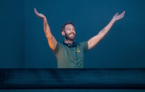 Calvin Harris Teases Beachy New Song & Fans Are Convinced Miley Cyrus Sings On It