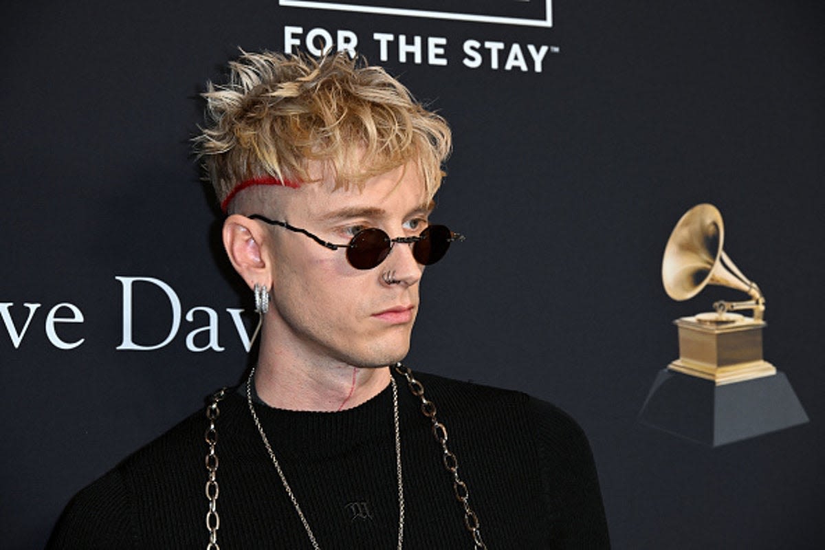 Machine Gun Kelly debuts new fang teeth in dentist’s office