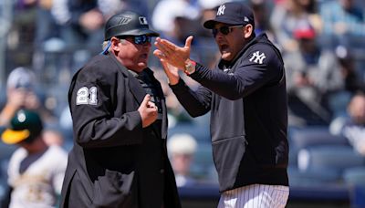 Yankees manager Aaron Boone ejected after umpire heard a fan yelling