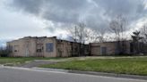 Blighted building in Tecumseh where hazardous materials were found to be torn down