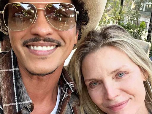 Michelle Pfeiffer Takes Selfie with Bruno Mars After 'Uptown Funk' Lyrics Namecheck Her: 'Look Who I Ran Into'