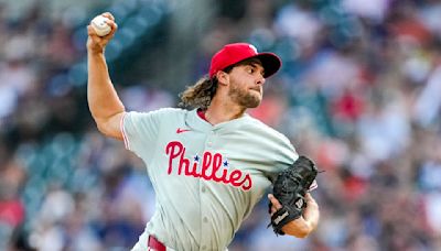 Former LSU pitcher Aaron Nola begins historic triple-play