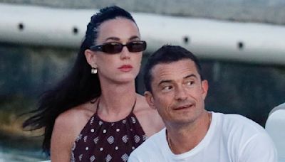 Katy Perry shows midriff during boat ride with fiance Orlando Bloom
