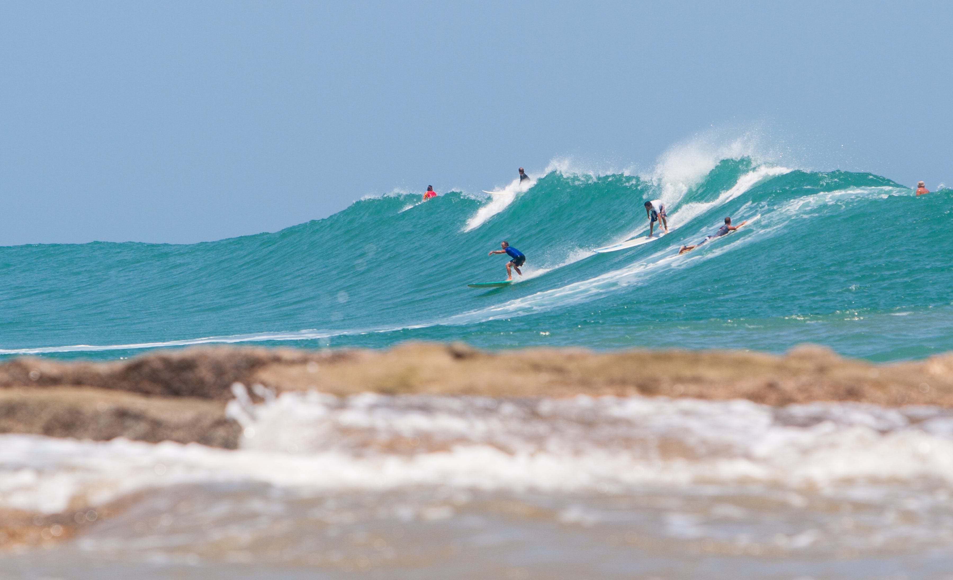 South Texas surfers ride out waves caused by tropical storms and hurricanes