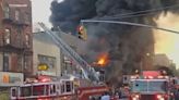 3 firefighters hurt as blaze in the Bronx rips through strip of businesses