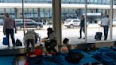 Chicago is keeping hundreds of migrants at airports while waiting on shelters and tents