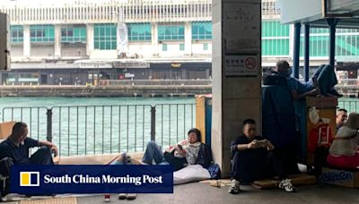 Hong Kong toy fans camping outside pier mistaken for tourists sleeping rough