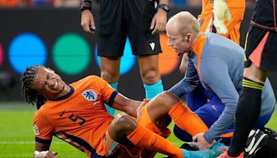 Manchester City’s Nathan Ake forced off with injury on international duty with the Netherlands