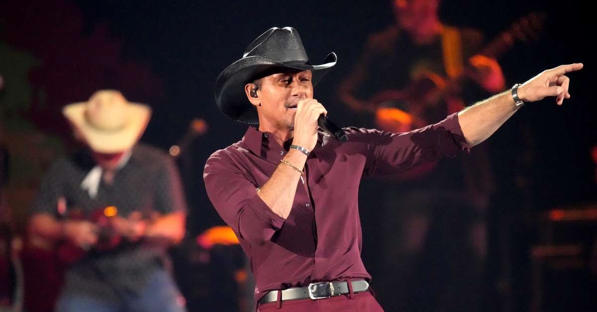 Tim McGraw Grants Fan’s Wish by Assisting With Baby Gender Reveal Onstage: ‘Tim or Faith?’