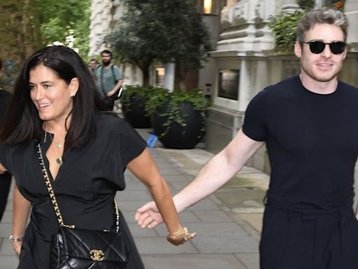 Richard Madden enjoys a day out in London with a mystery female friend