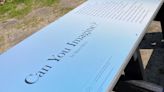 Why is there a poem on a picnic table in Beech Forest? Cape Cod display first of 7 in U.S.