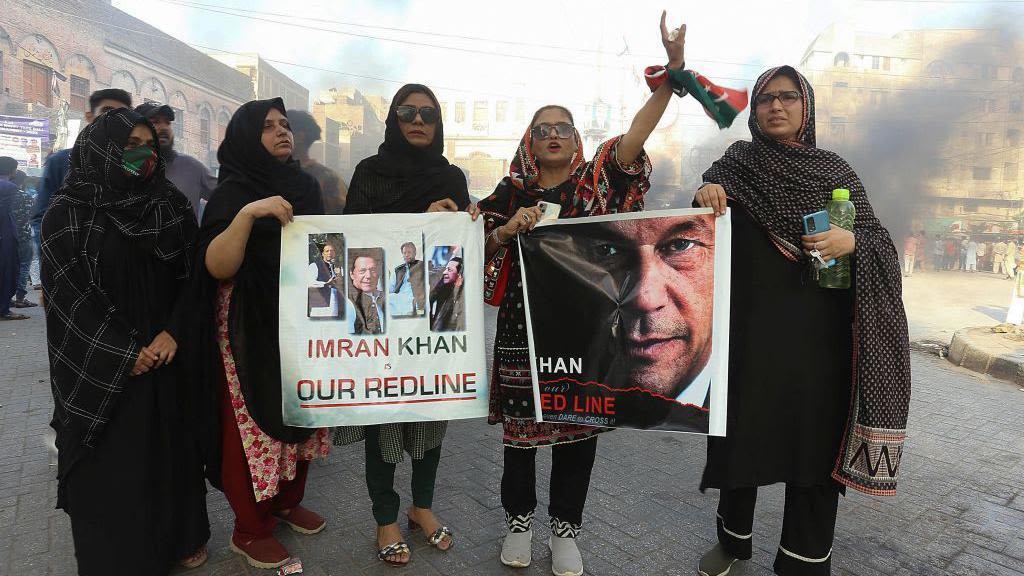 One year after Imran Khan's supporters stormed Pakistan - they can't move on