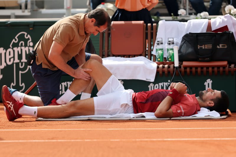 Top-ranked Novak Djokovic tears meniscus, withdraws from French Open