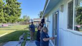 Bankers brighten up Blackfoot home during 32nd annual Paint-a-Thon