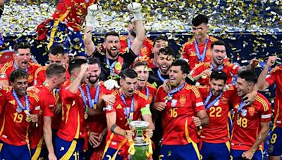 Sublime Spain strike late to win record fourth Euro crown