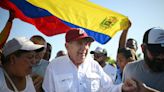 Venezuela says presidential opposition candidate has left country