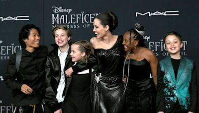 Angelina Jolie’s Motherhood Style Evolution: Muted Tones, Classic Silhouettes and More Coordinated Red Carpet Looks With Her Kids