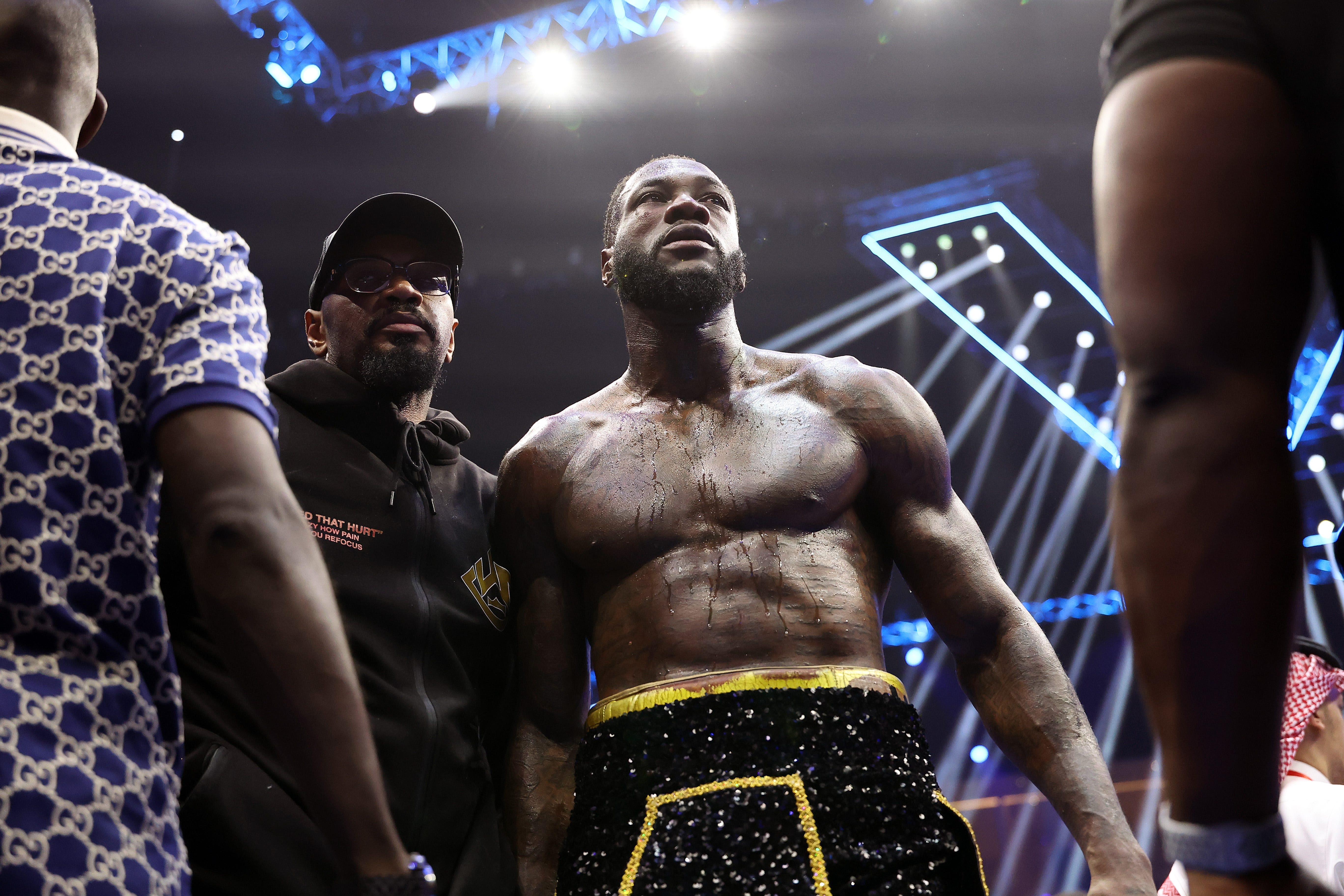 Deontay Wilder's dad wants trainer fired after loss to Zilhei Zhang adds to boxer's struggles