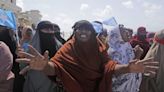 Hundreds gather at Somalia beach to condemn attack that killed 37 and demand stronger security