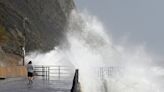 Storms batter southern England as flooding causes travel disruption