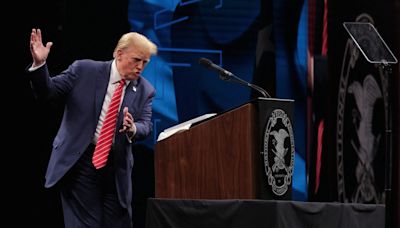 Trump claims ‘low IQ’ Biden only has to stay upright to be declared winner of debates in NRA speech: Live