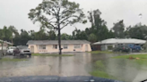 Maneuvering through flooded roads in Fort Myers