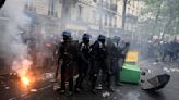 Clashes erupt in France as hundreds of thousands protest pension reforms