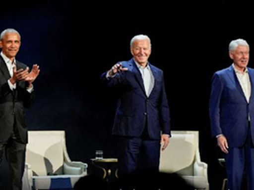 Obama, Clintons praise Biden