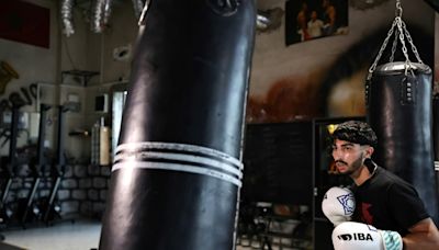 First Palestinian Olympic boxer fights hurdles before history