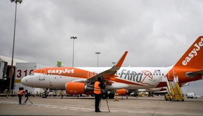 EasyJet chaos as 'drunk Brit tries to open plane door' and fights cabin crew mid-air