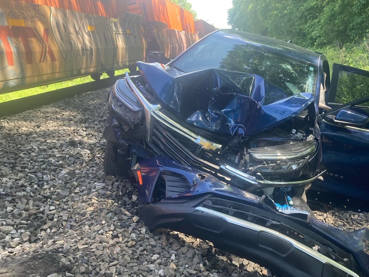 Train crashes into SUV after driver abandons vehicle on tracks, deputies say