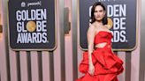 Lily James Fires Up the Golden Globes Red Carpet in Scarlet Gown