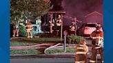 No injuries after overnight fire destroys garage, damages home in Grandville