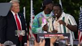 Trump appeared on stage at his Bronx rally with two rappers charged in a felony gang case