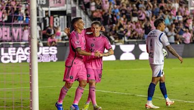 Messi watches as Inter Miami beats Puebla 2-0 in Leagues Cup opener. Goals by Rojas, Suarez