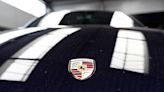 Porsche AG shares rise to top of DAX, traders point to pre-close call