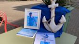 Town turns blue for fallen Royal Navy sailor