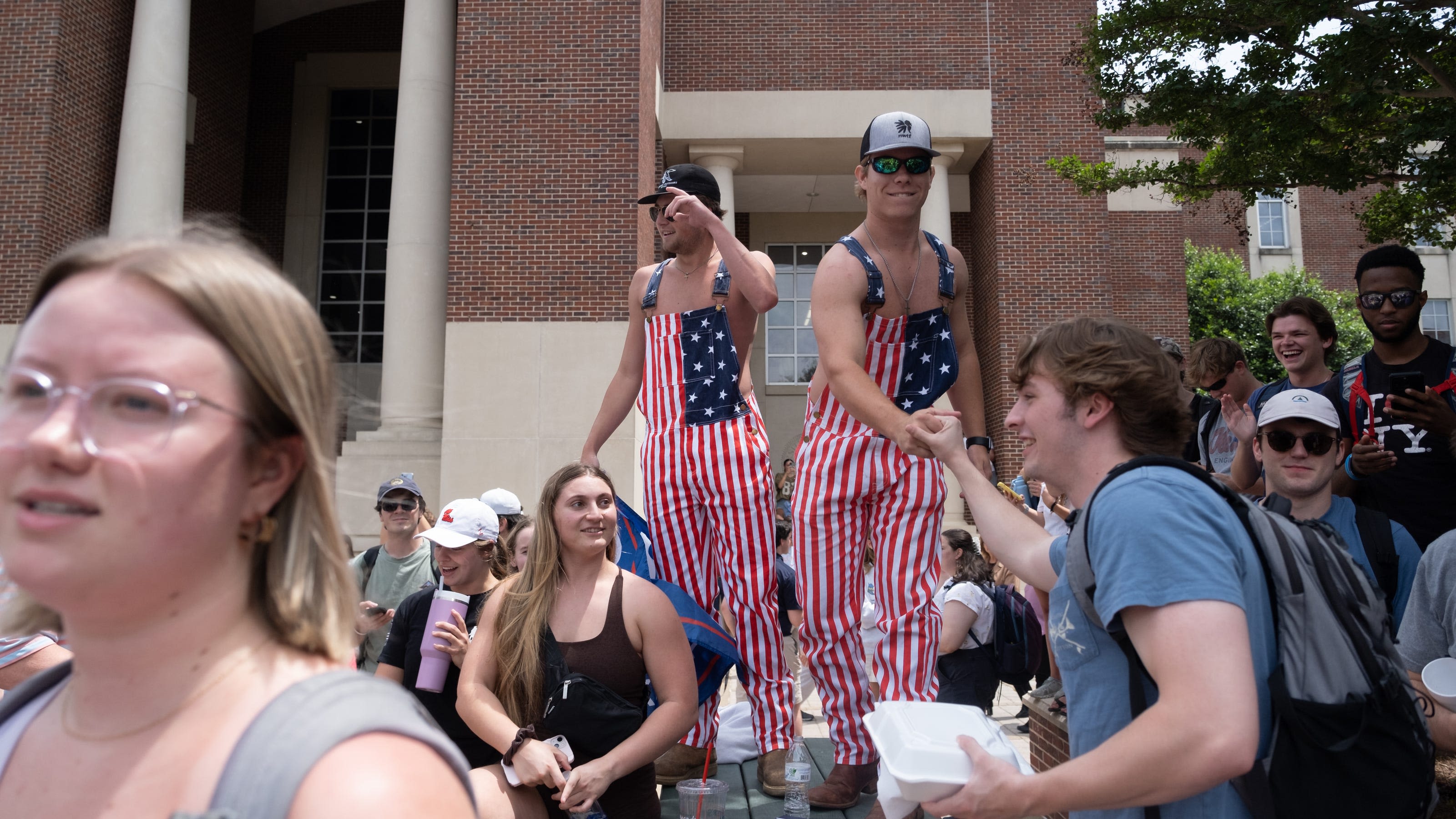Photo of University of Mississippi students with 'Trump won' flag is altered | Fact check