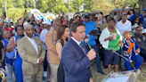 Gov. Ron DeSantis jeered as Jacksonville community calls for action in wake of hate crime