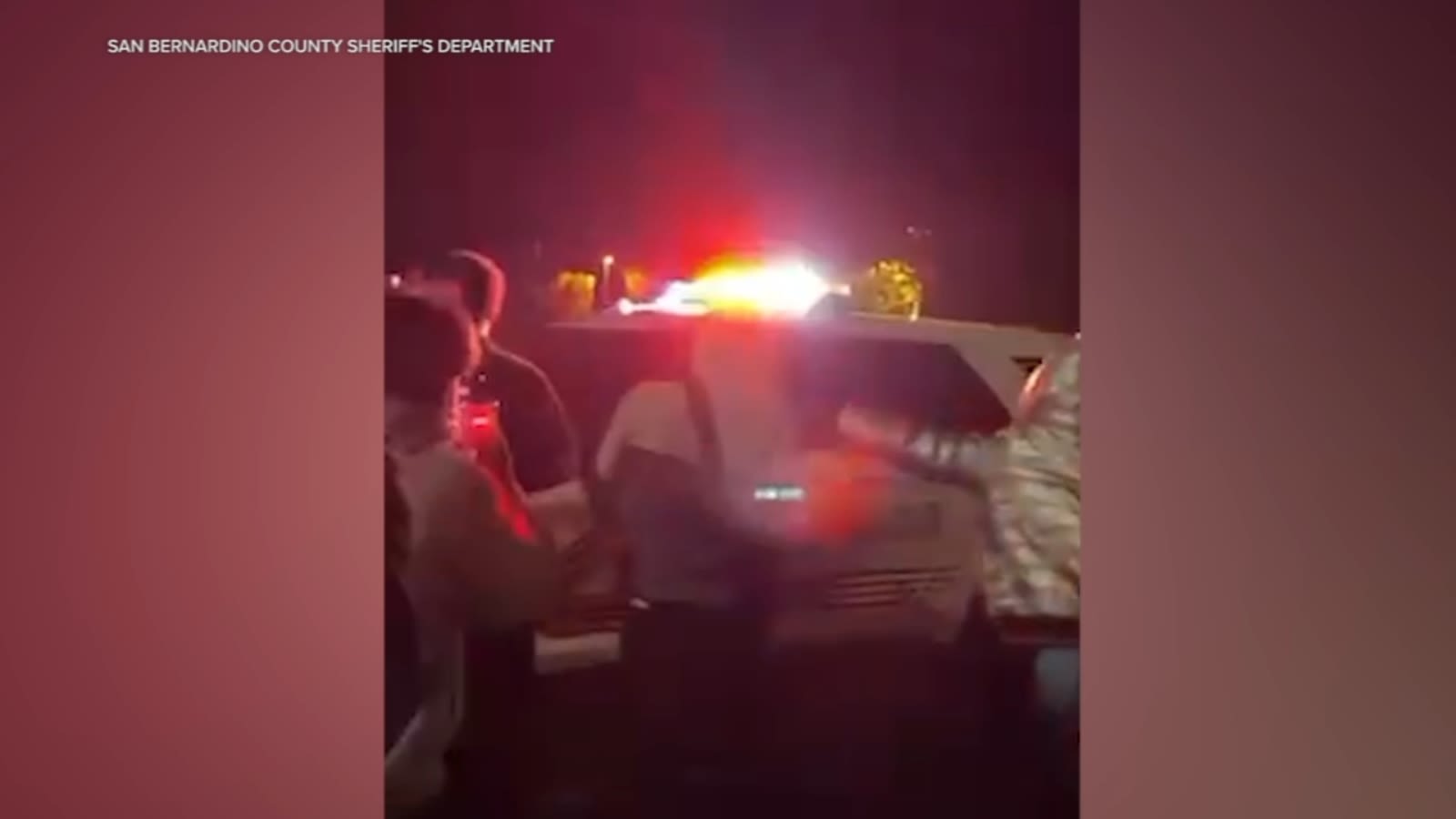 Teen arrested after mob attacks sheriff's cruiser at street takeover in Highland