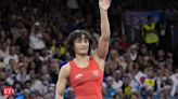 Vinesh Phogat opens up about her life and career in emotional post; talks of her father's death, mother's cancer diagnosis - The Economic Times