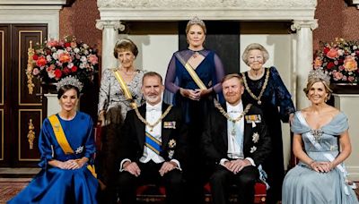 Queen Letizia of Spain, Queen Maxima and Crown Princess Amalia of The Netherlands colour co-ordinate in elegant blue gowns for a lavish state banquet in Amsterdam